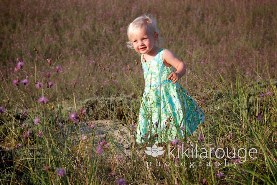 Toddler in wild flower field