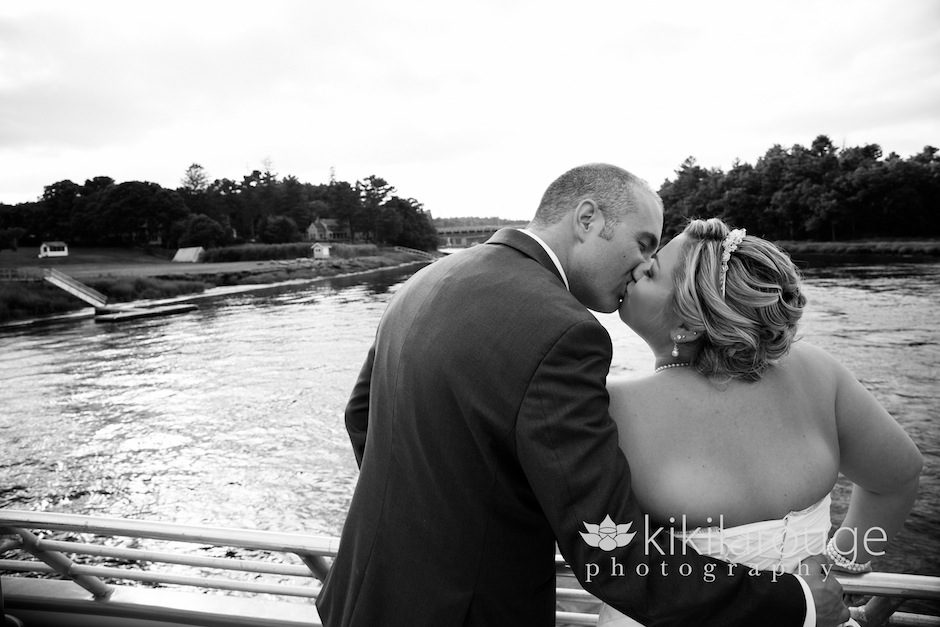 Bride and Groom Kissing on boat