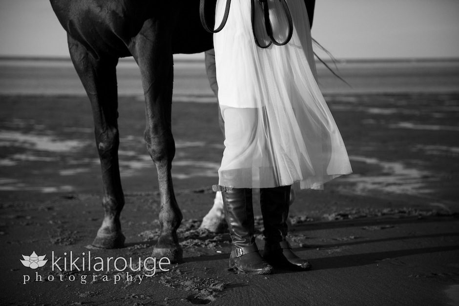 Girl on beach with horse