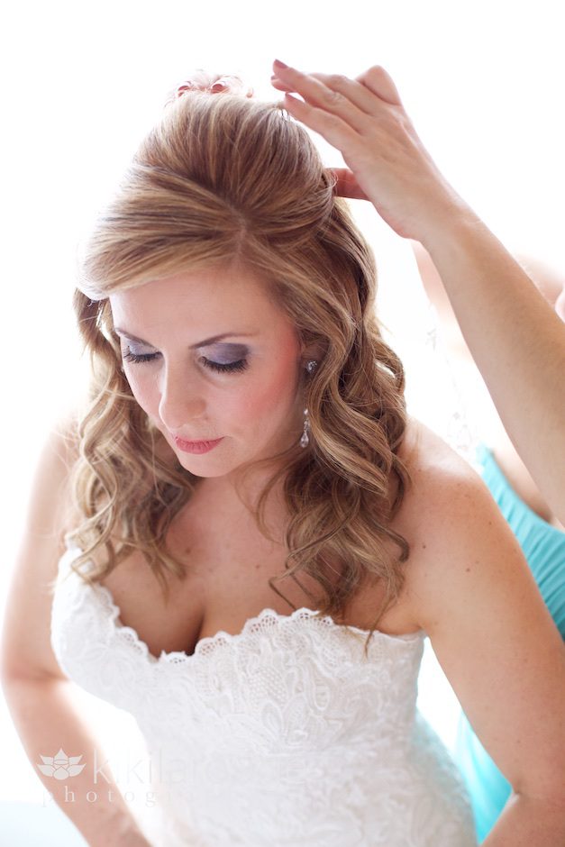 Bride getting veil on