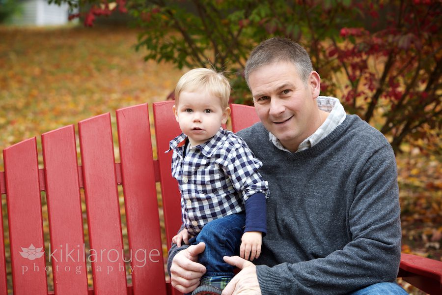 Dad and son portrait on red chair