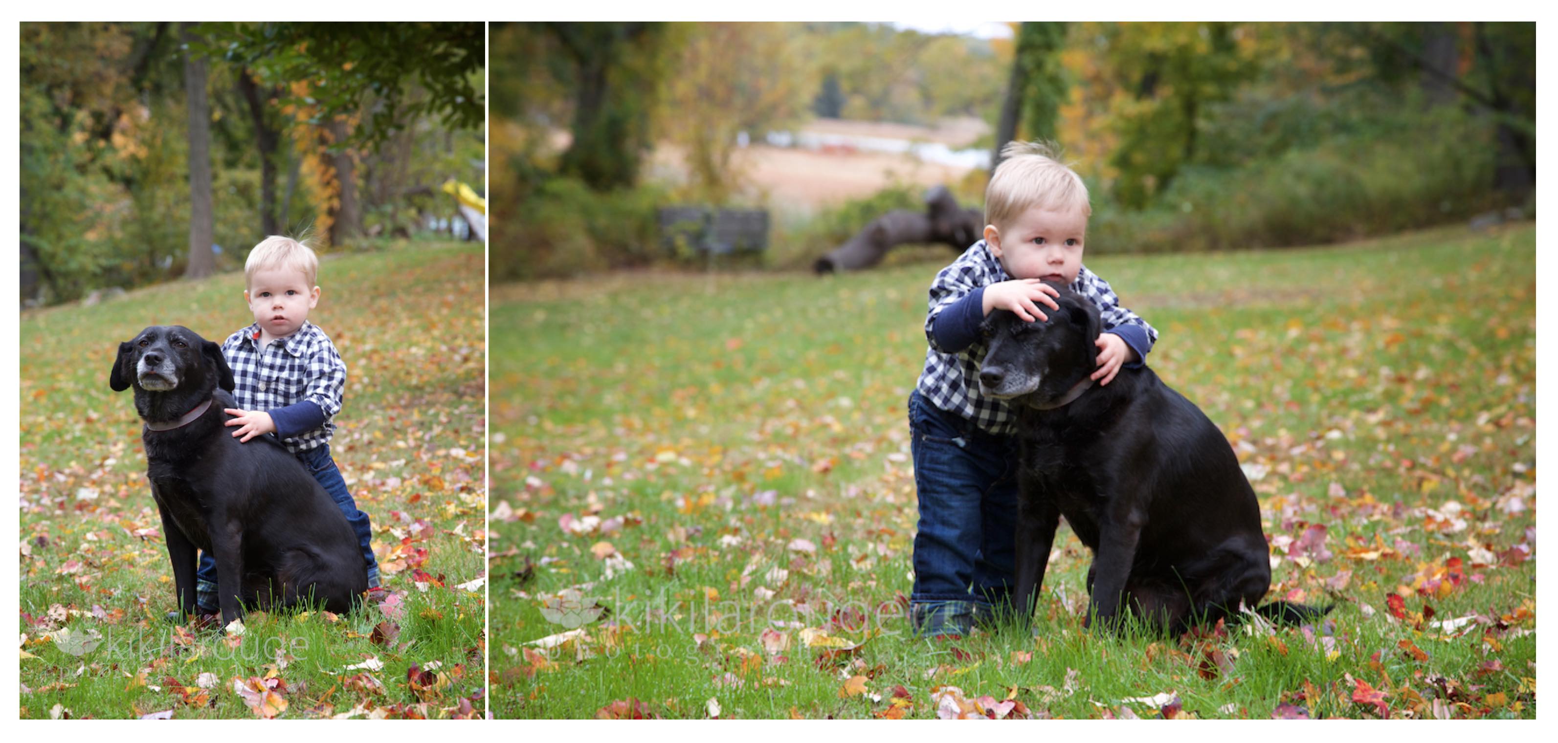 Little boy with his black dog