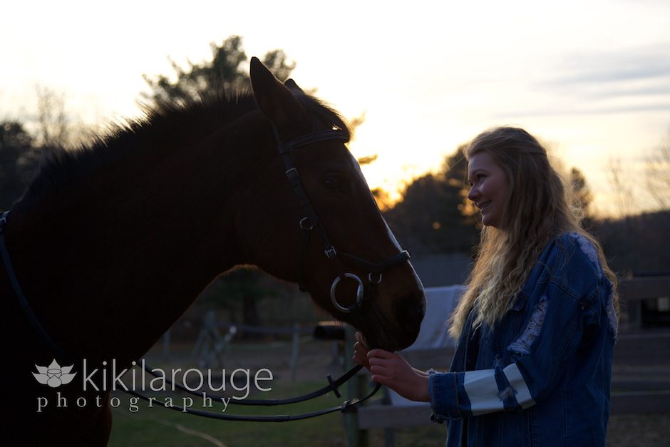 Horse and girl at sunset
