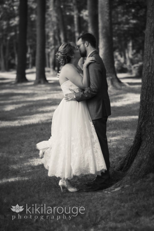 Bride and Groom Kissing in trees