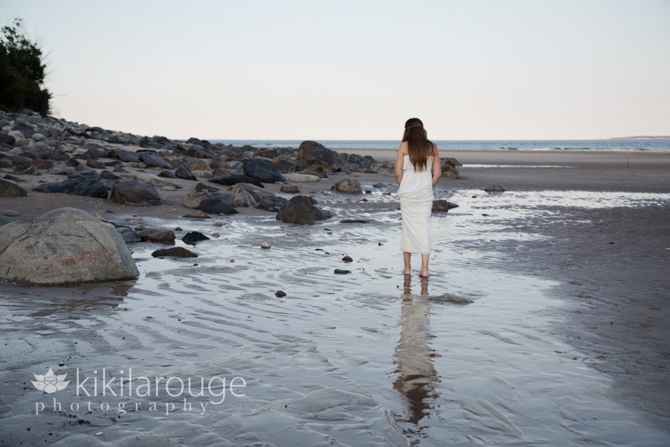 Girl in white dress on beach