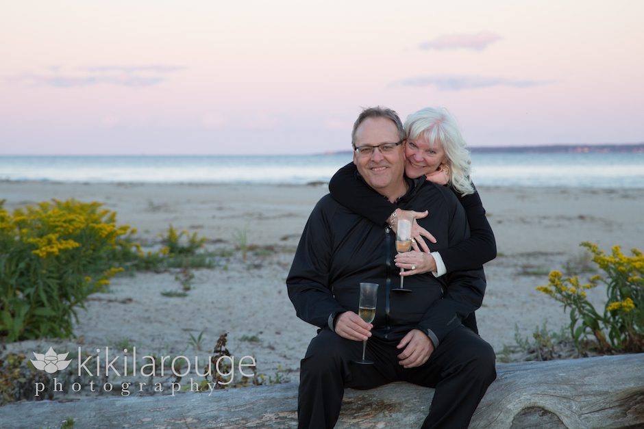 Engaged Couple with Champagne at Beach