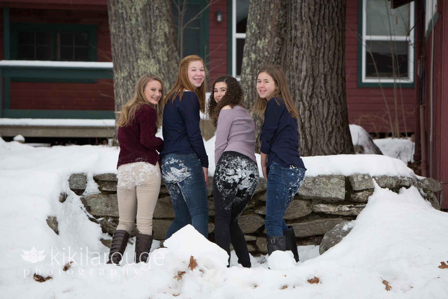 Four cousins with snow on their butts
