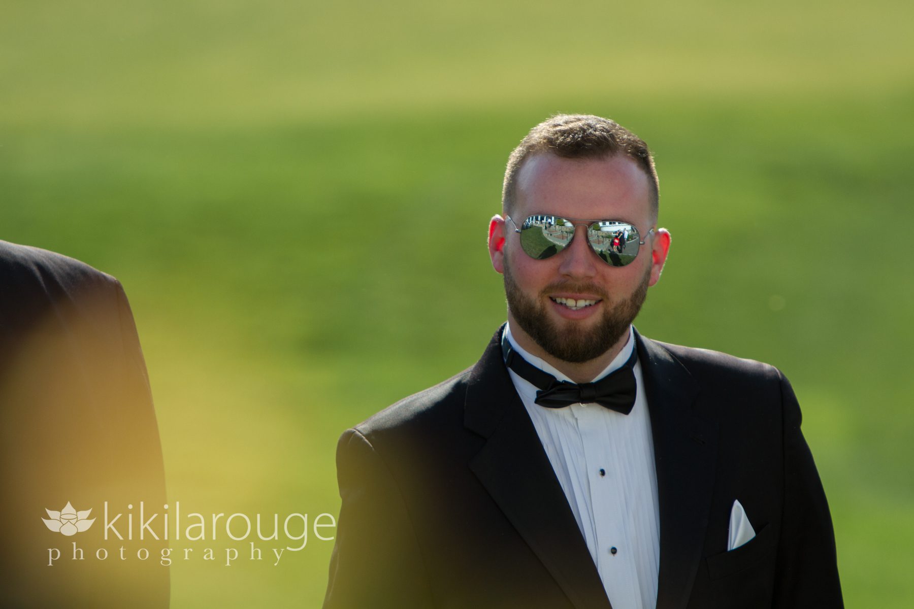 Best Man in shades on golf course