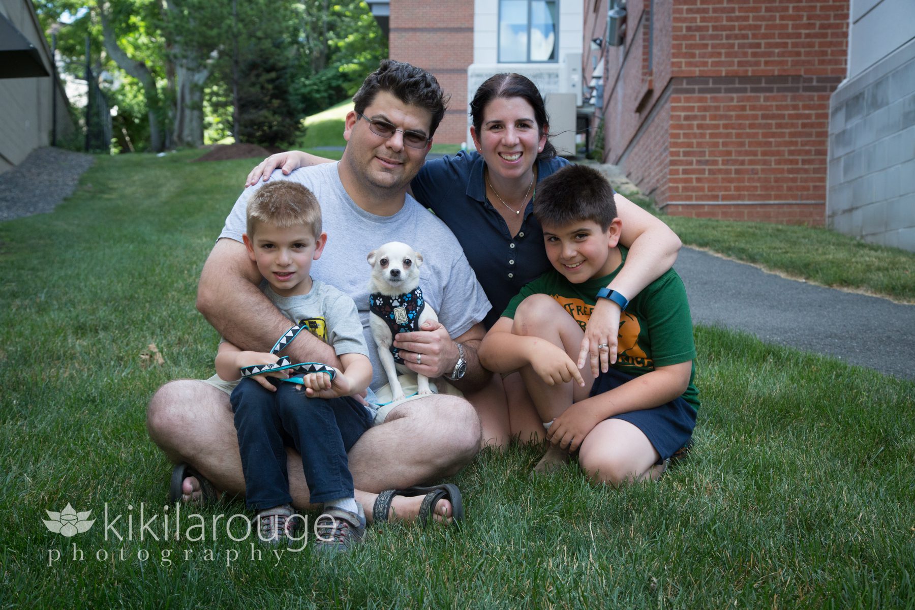 Family with their newly adopted dog