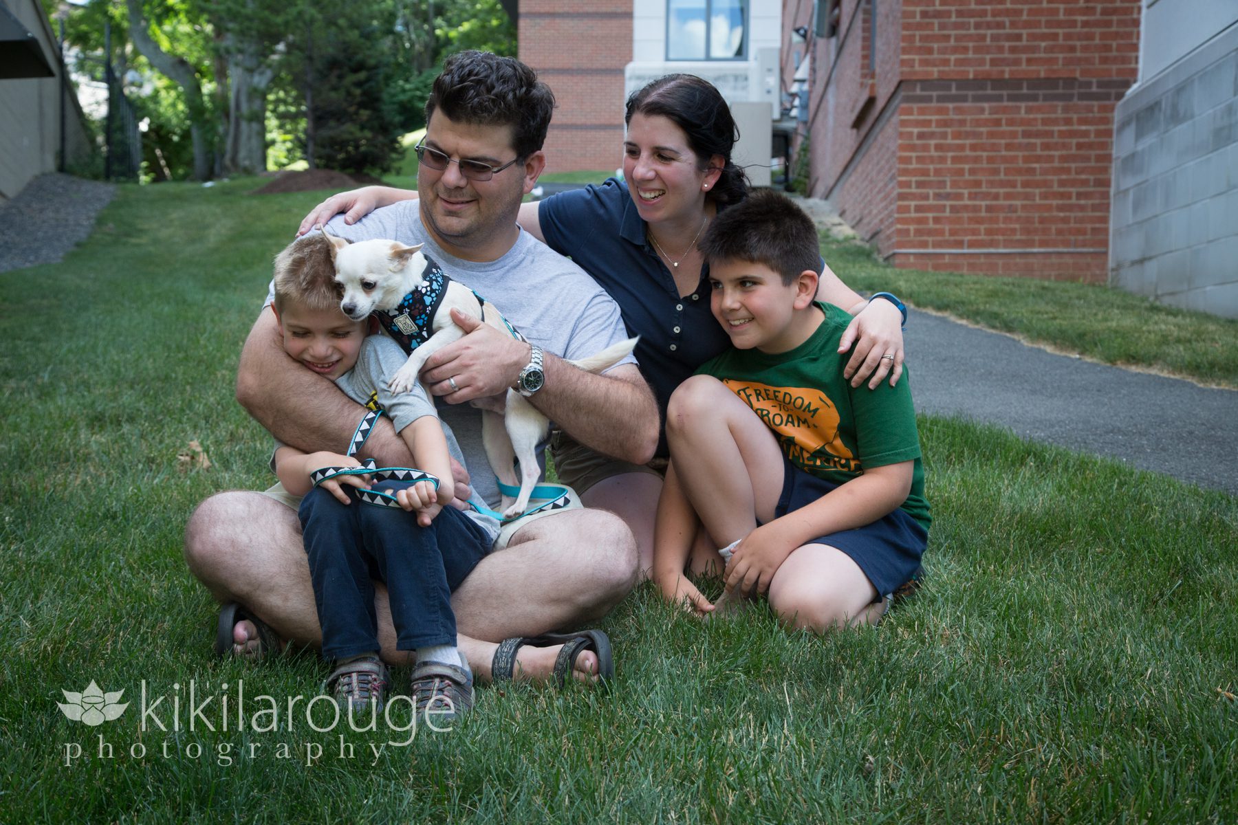Family with their newly adopted dog