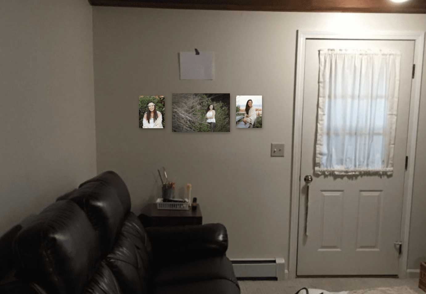 Senior Portraits displayed on living room wall