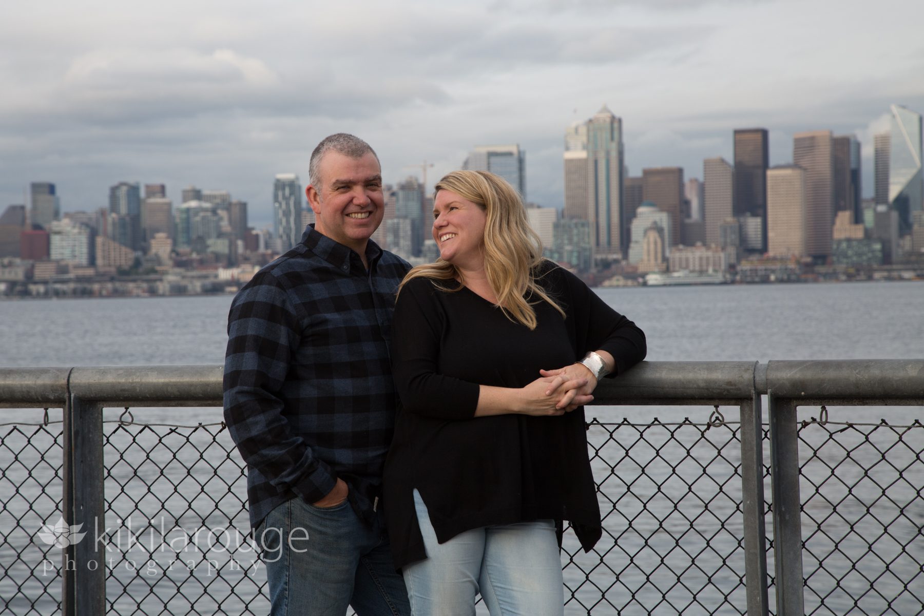 Couple portrait with Seattle skyline