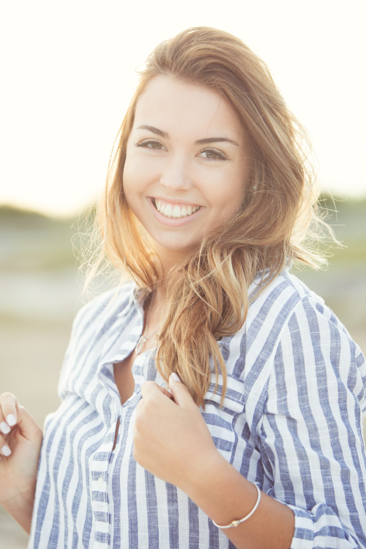 Senior Portrait girl striped shirt beach