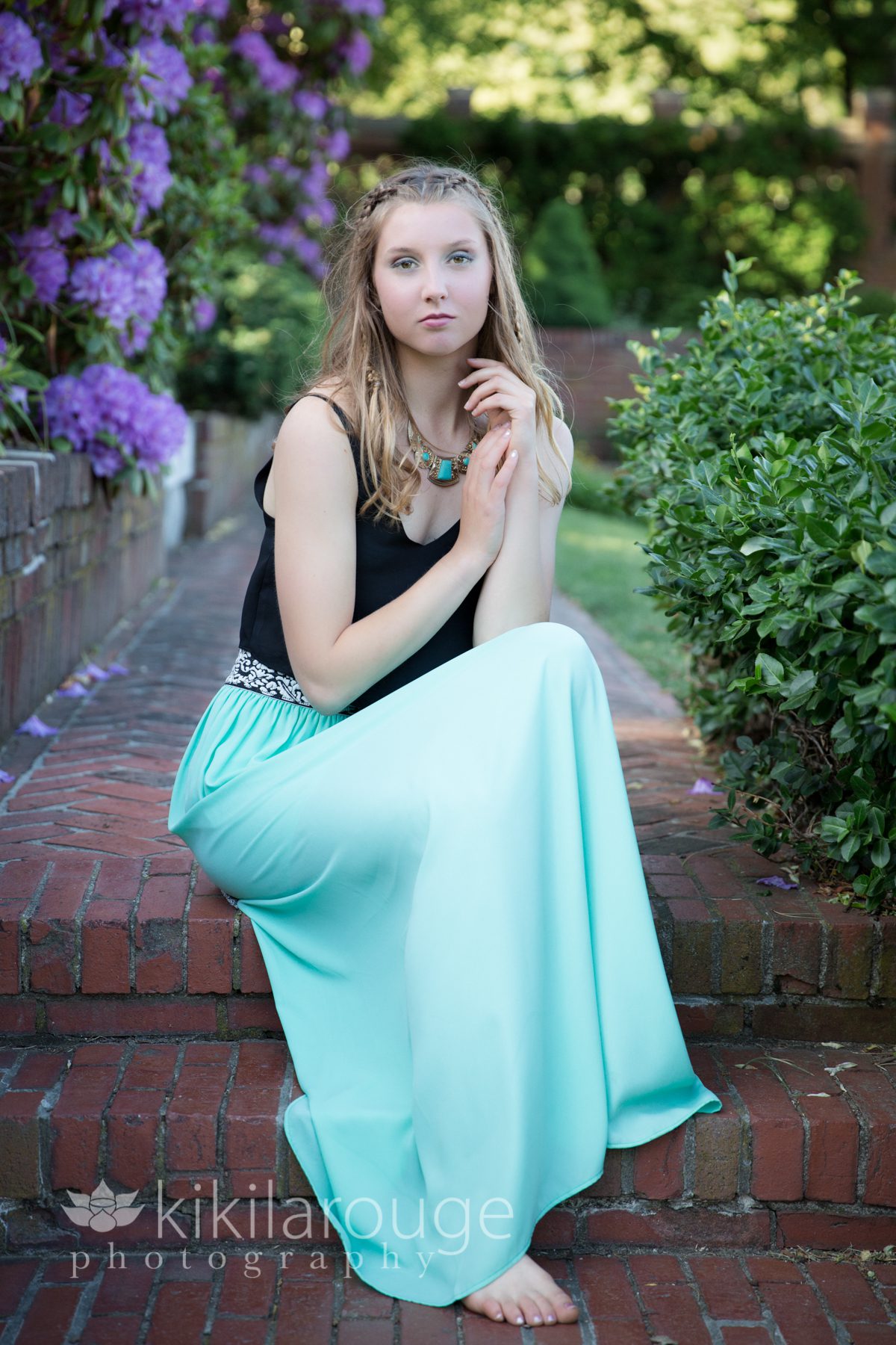 Senior modeling bohemian look in mint long skirt