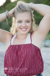 Senior Girl on beach at sunset