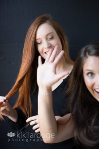 Outtake of two sisters being silly at photoshoot
