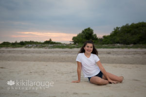 Sunset at beach with your girl sitting in sand