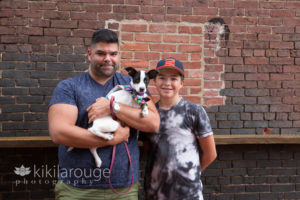Little chihuahua mix puppy with new adopted family