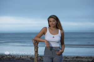 Senior girl white top seersucker pants on Plum Island Beach