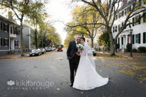 Newly married couple on Chestnut street with trolley in background