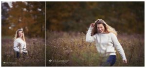 Senior portraits girl walking in a field of flowers