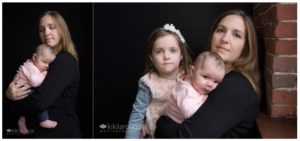 Mom with her two daughters black background