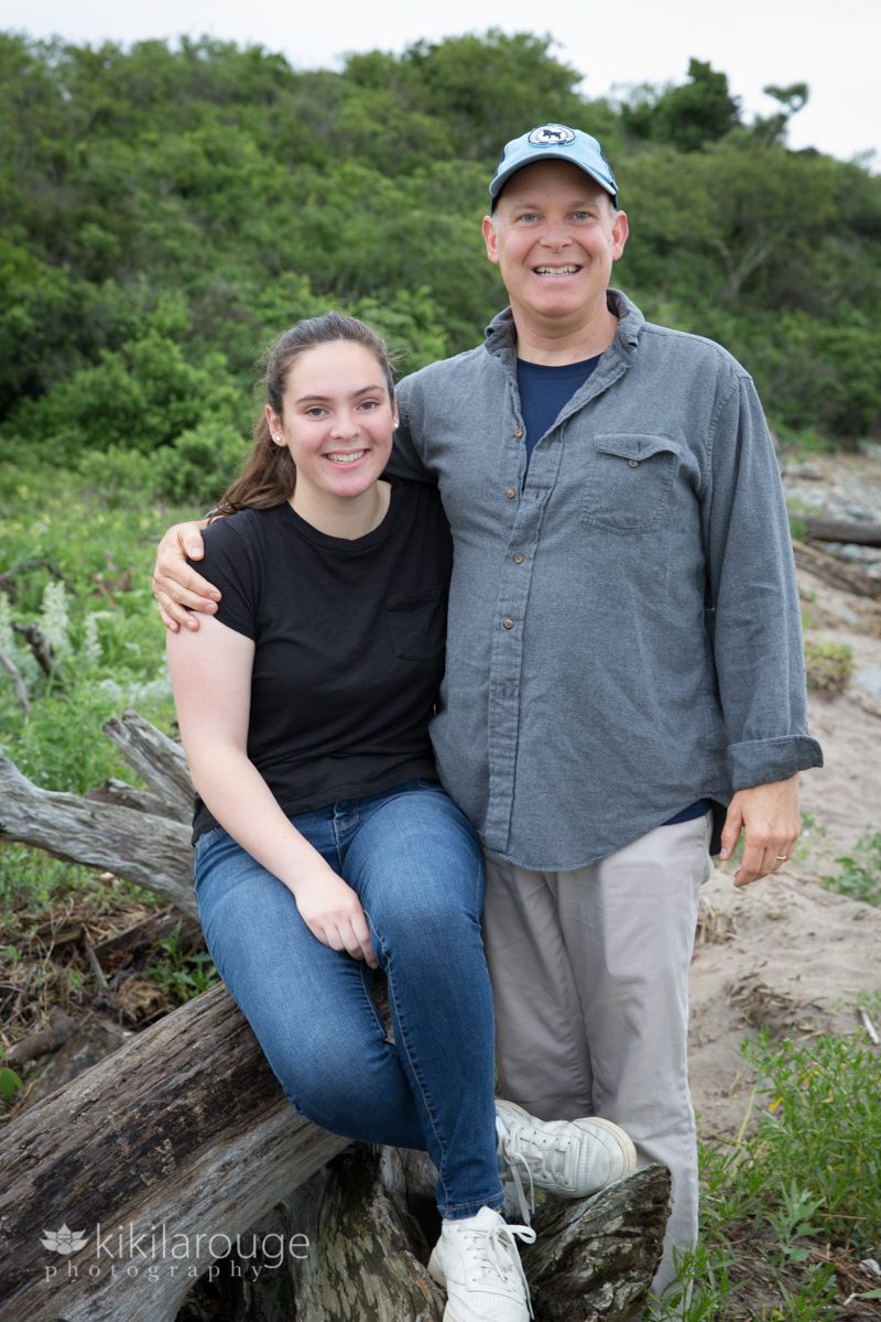 Teen girl in jeans in portrait with father