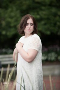 Senior portrait girl in white lace dress