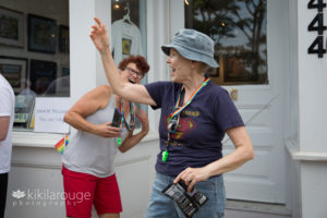 Women laughing at parade