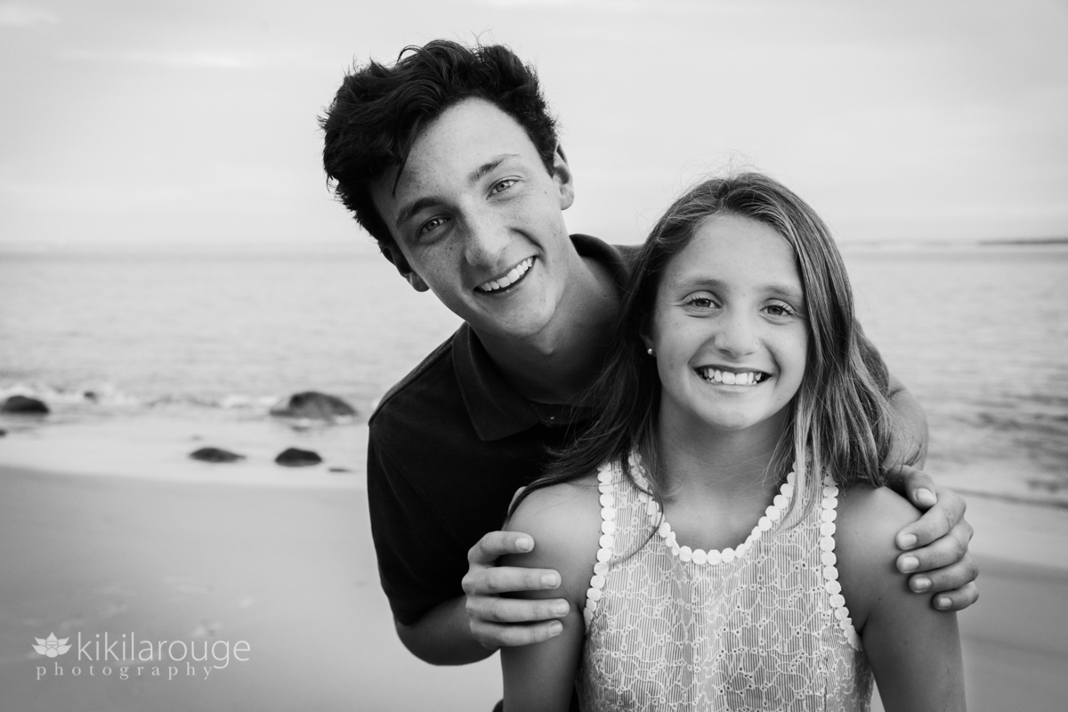 Brother and sister portrait smiling at camera