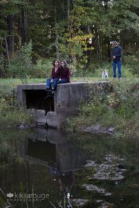 Family portrait by pond