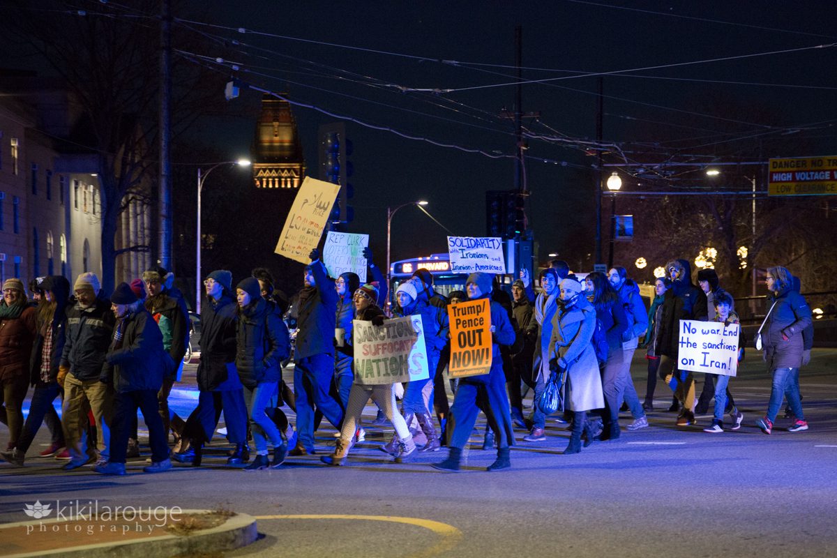 Antiwar protesters in crosswalk heading to Harvard rally