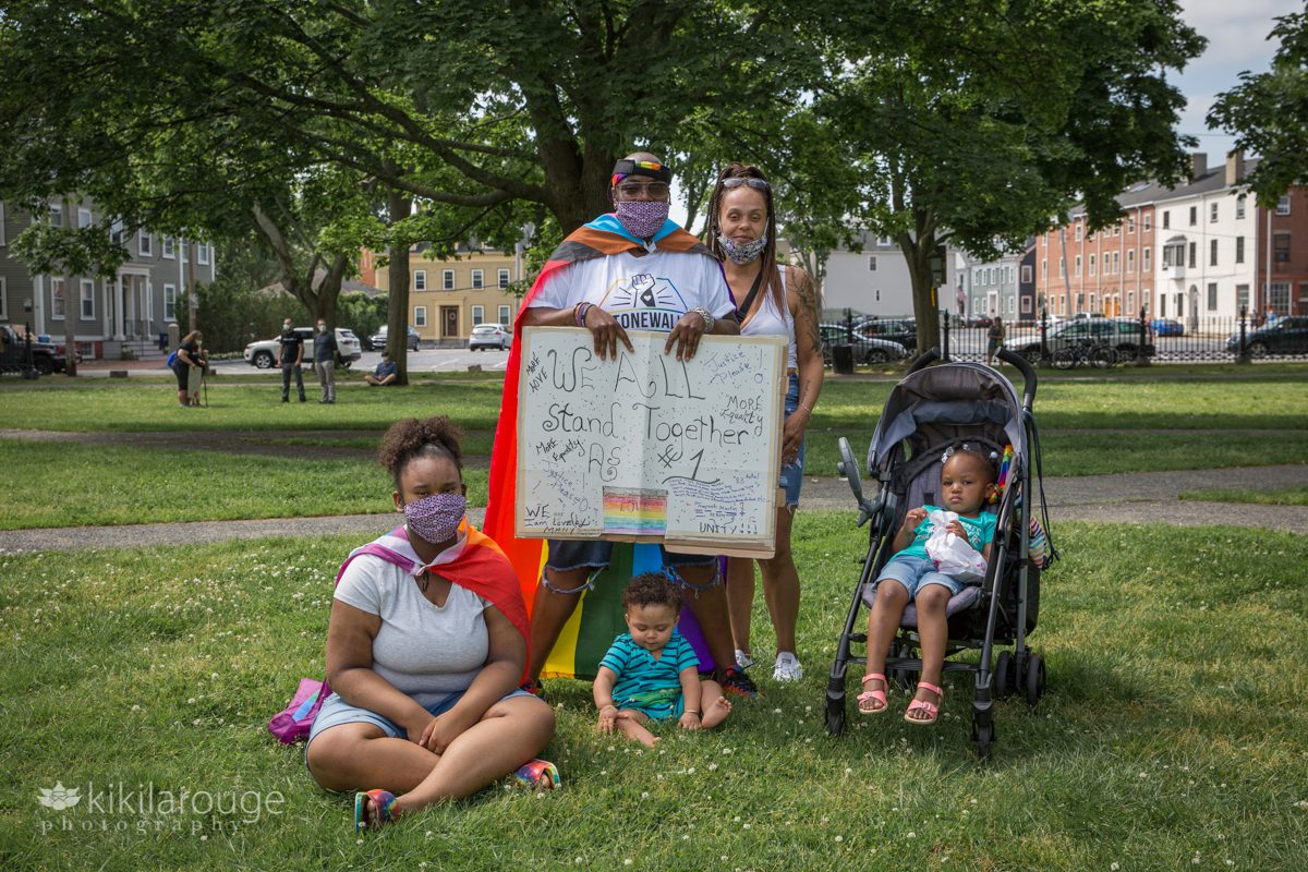 Familiy in rainbow flags at BLM rally Salem