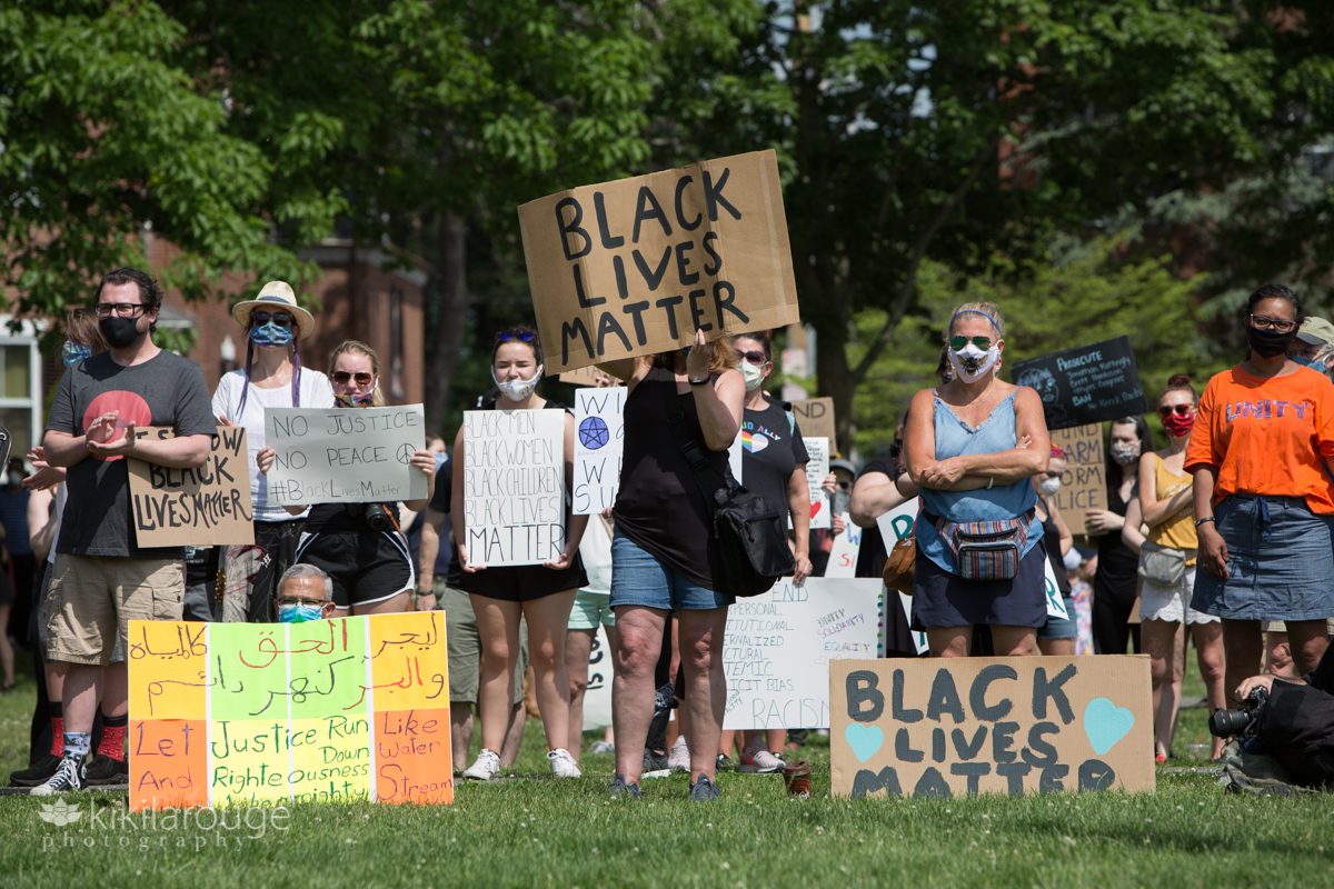 Crowd with BLM signs and messages at Salem rally event
