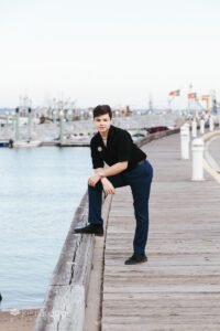 Boy standing on Ptown pier