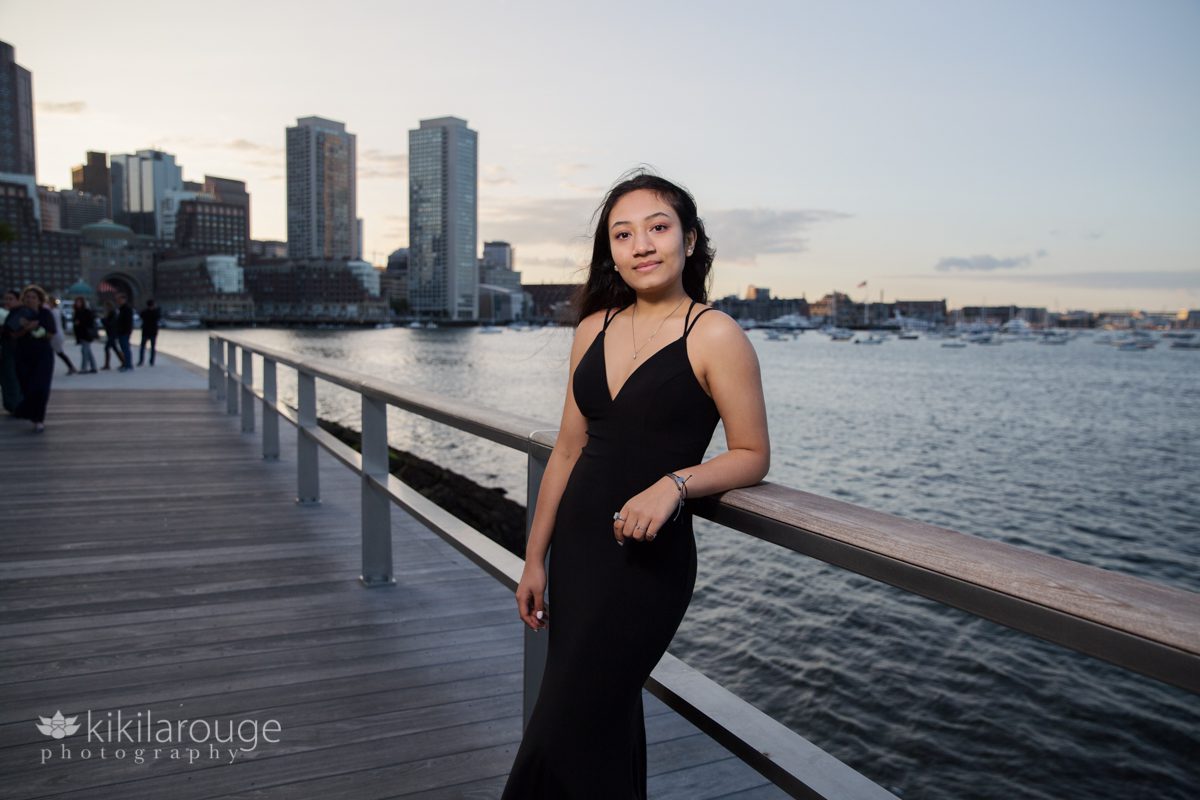 Sunset portrait of girl in black prom dress Boston