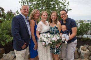 Family portrait of bride with her parents and sister