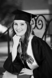 BW portrait of UNH college graduate long brunette hair