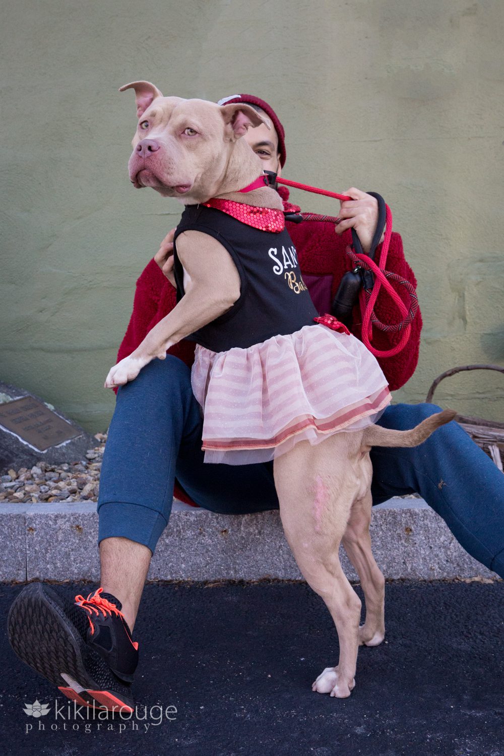 Pit rescue in dress with tutu and man in red fleece