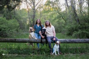 Cute couple with their three dogs two rescues and a sweet old Brittnay Spaniel