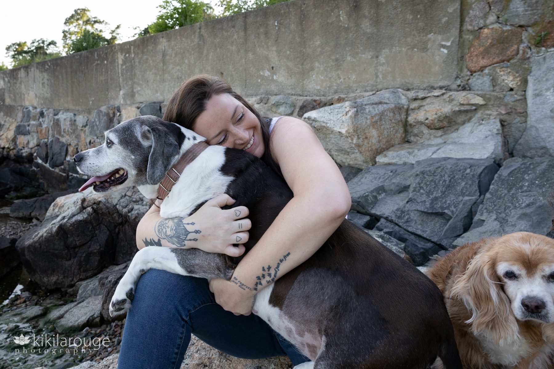 Woman hugging her Senior Rescue Dog