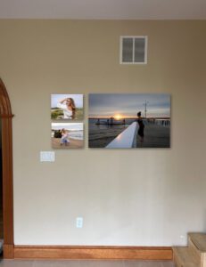 Three wall art portraits on client home walls
