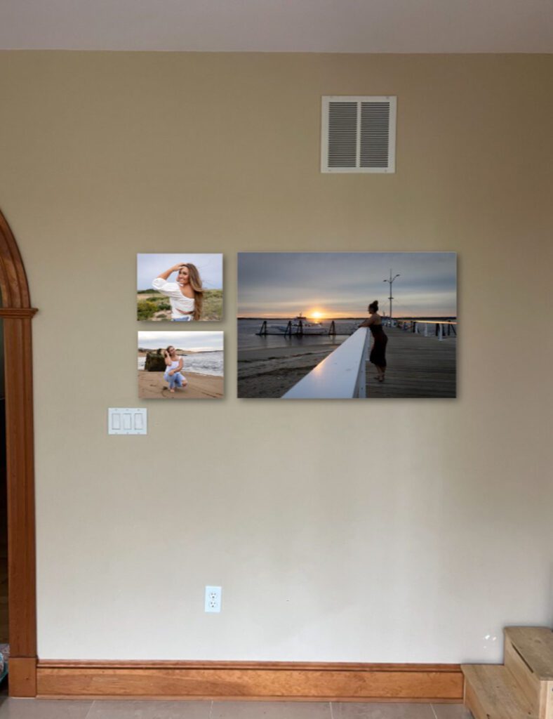 Three wall art portraits on client home walls