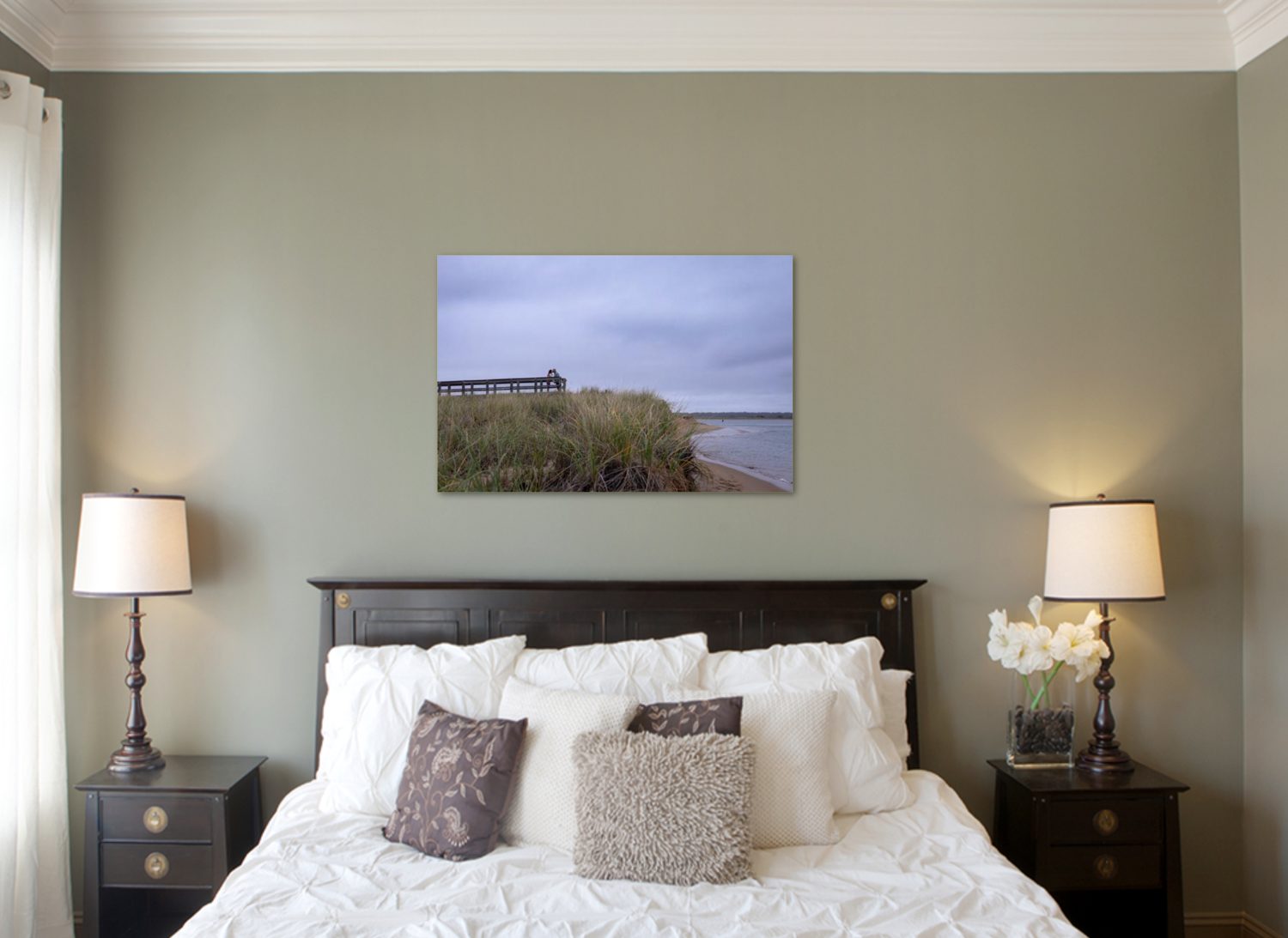 Wall art sample of couple on beach in a bedroom setting