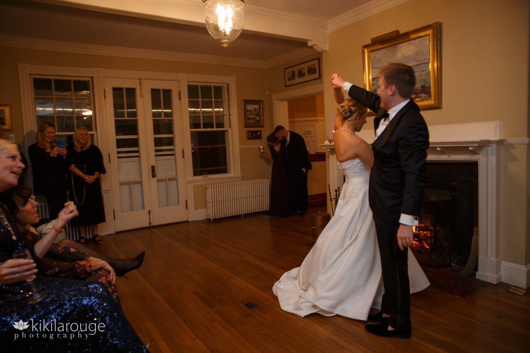 Wedding couple first dance twirling bride