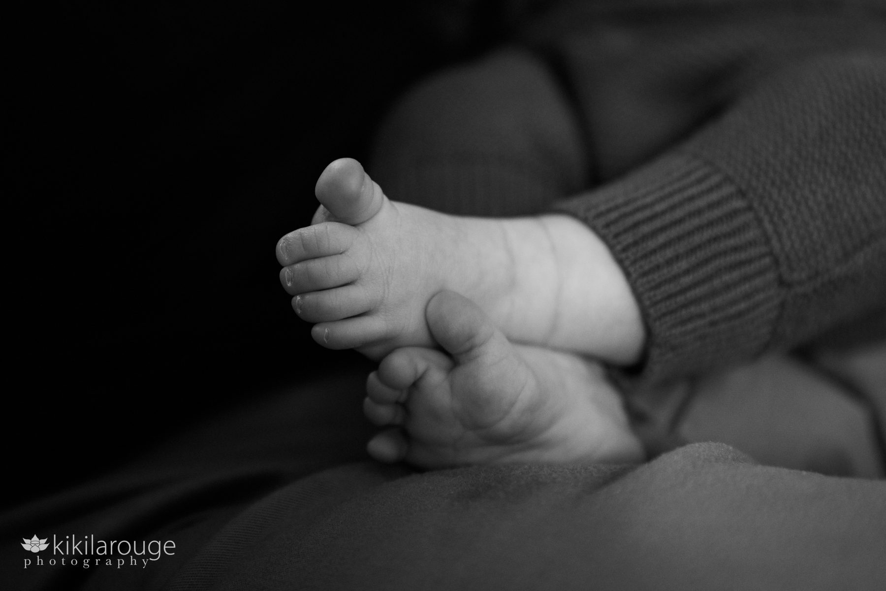 Close of 2 month old baby's feet and toes