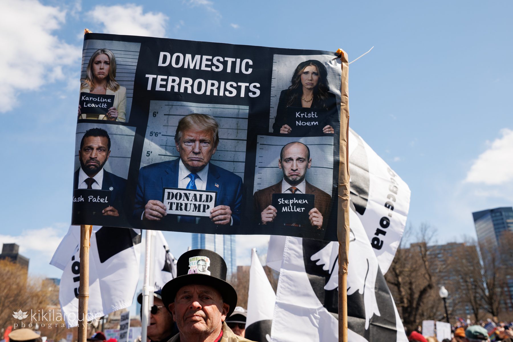 Domestic terrorist sign on the Boston Common at No Kings third international protest of Trump and his admin
