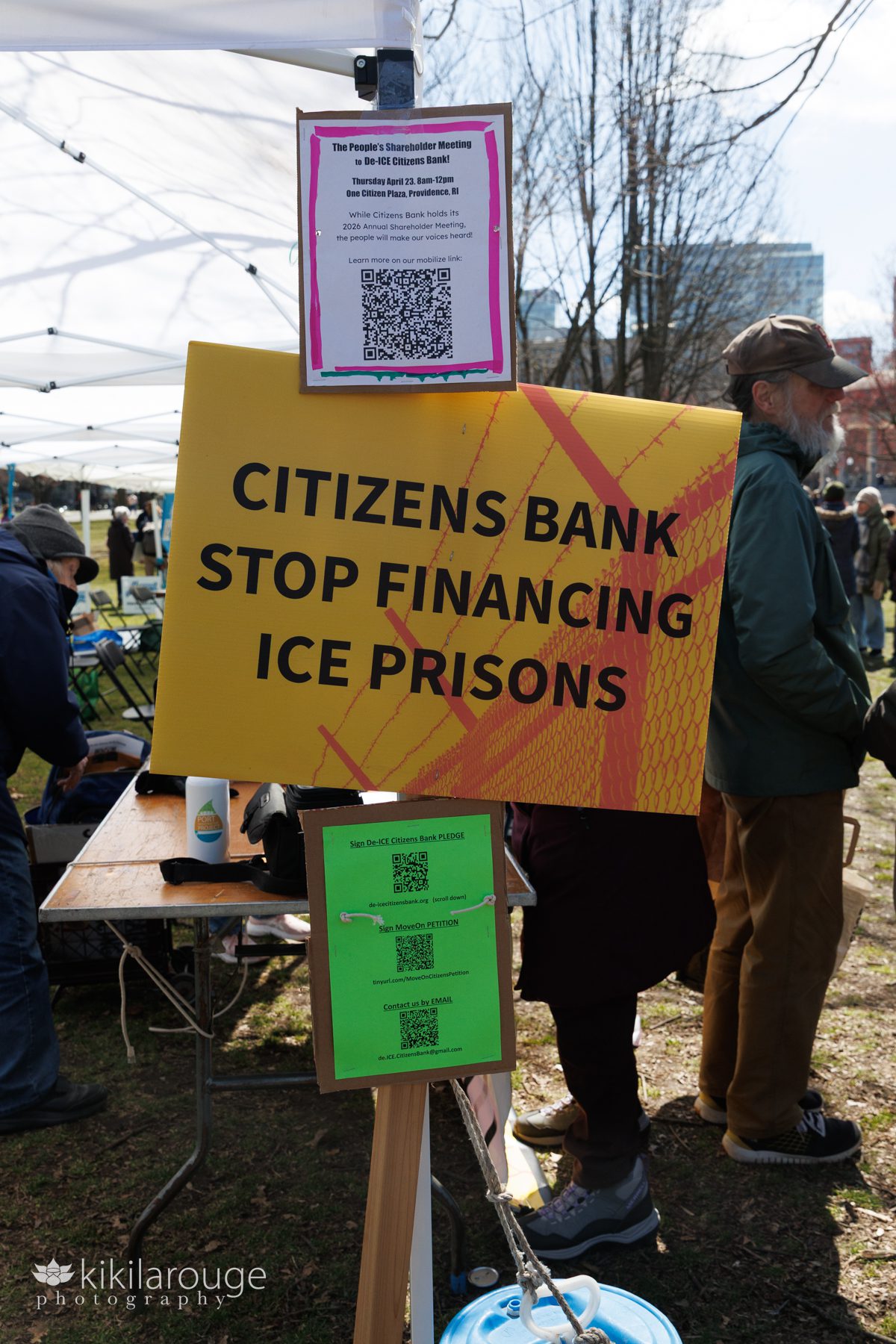 Sign at No Kings protest Boston telling Citizens Bank to stop funding Ice Prisons