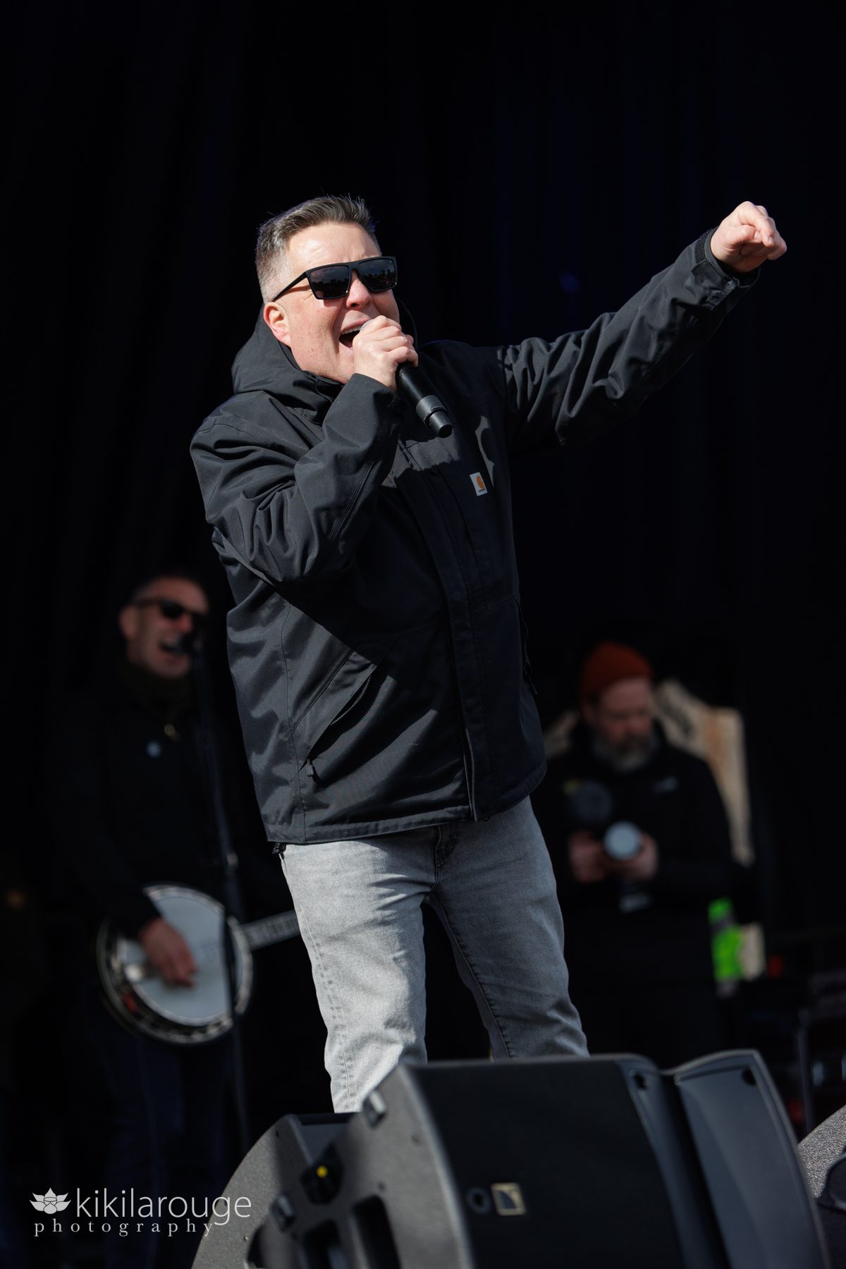 Leader singer Ken Casey of the Celtic Punk band the Dropkick Murphys singing resistance songs at the No Kings Protest on the Boston Common 
