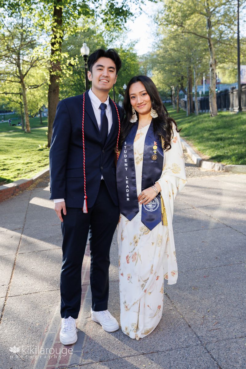 Cute Nepali couple with their college graduation tassels in Boston Common